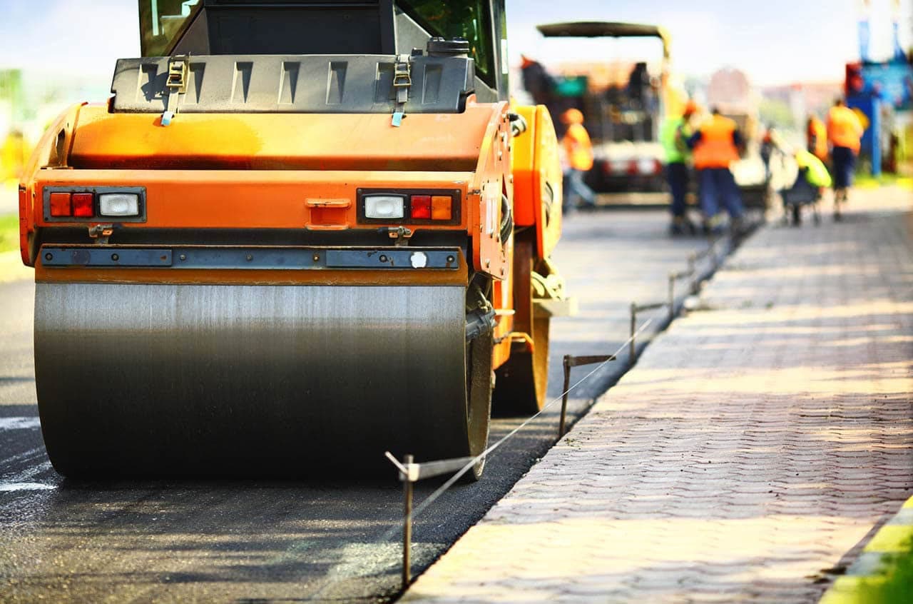 Asphalt Paving crews working in Grand Prairie, TX