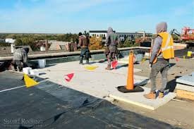 Commercial Roofing crews working in Grand Prairie, TX